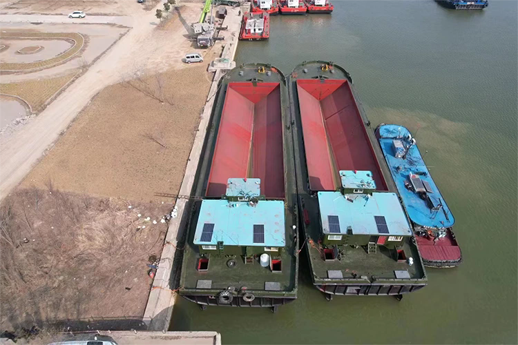 Hoe verbetert een splijthopper de baggerefficiëntie en het transport van maritiem materiaal?